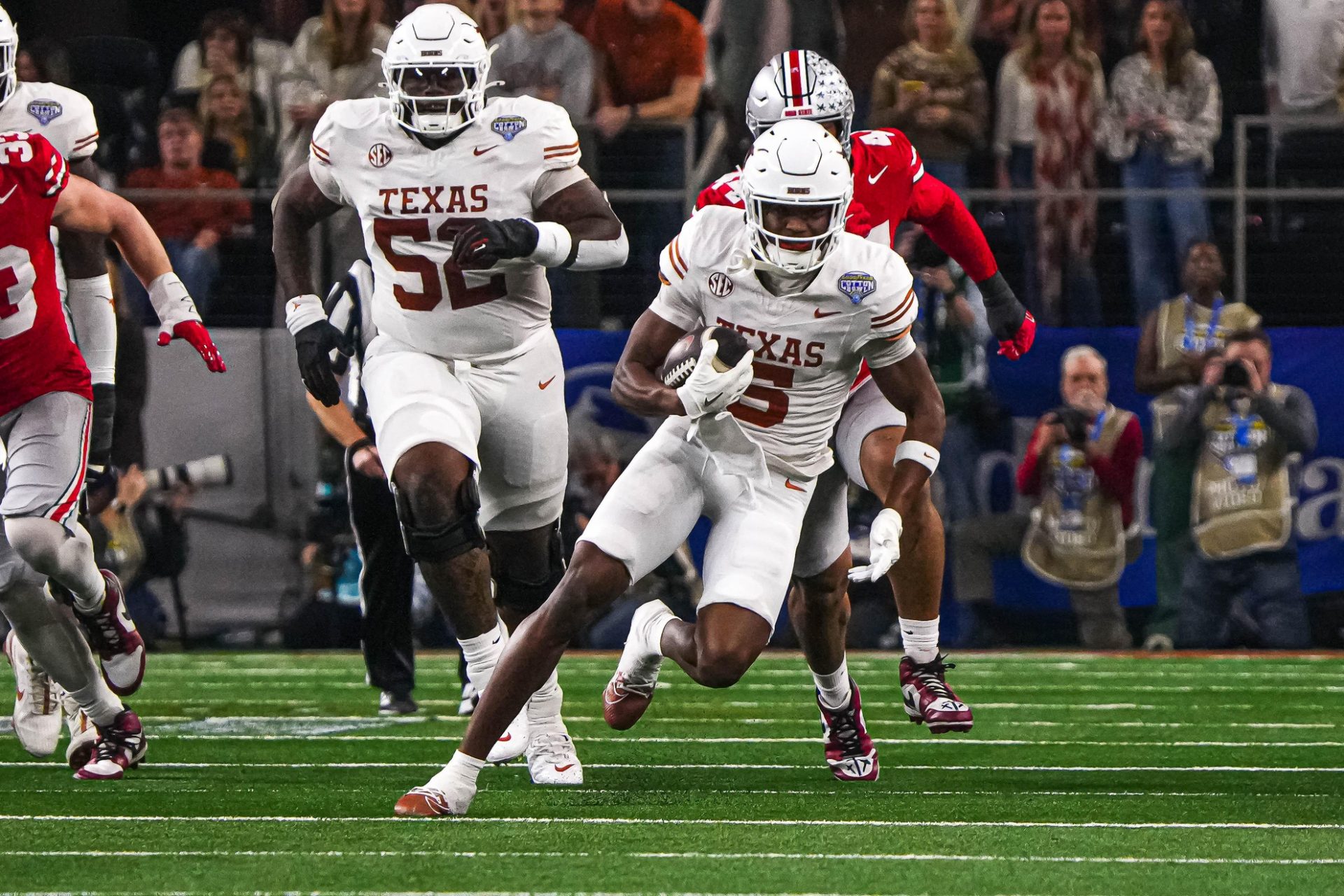 Texas Longhorns receiver Ryan Wingo (5) runs the ball during the College Football Playoff semifinal game against Ohio State in the Cotton Bowl