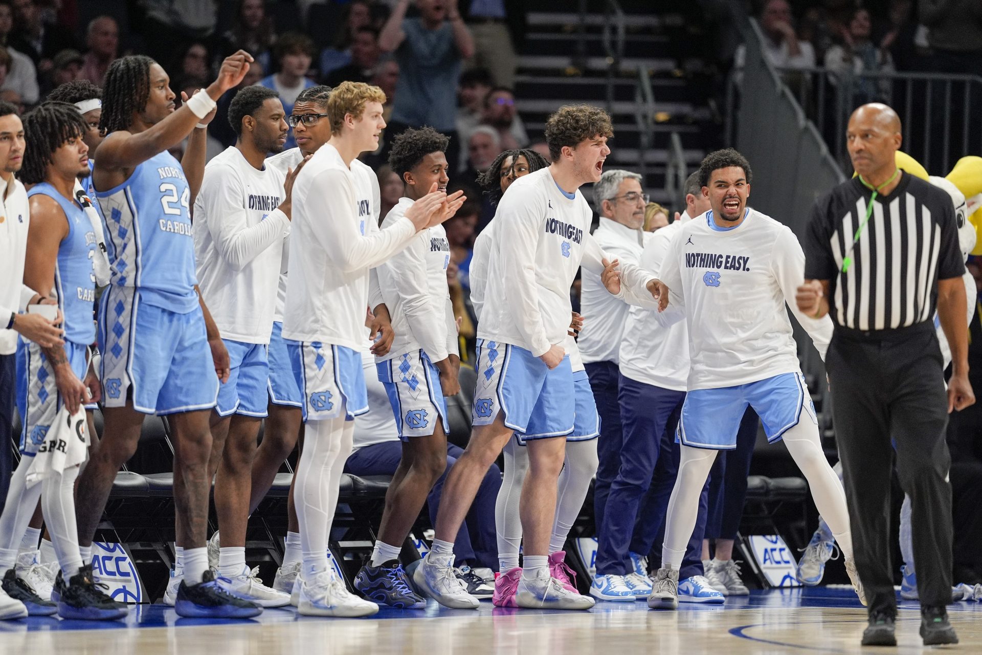 North Carolina Tar Heels bench erupts after a play against the Duke Blue Devils