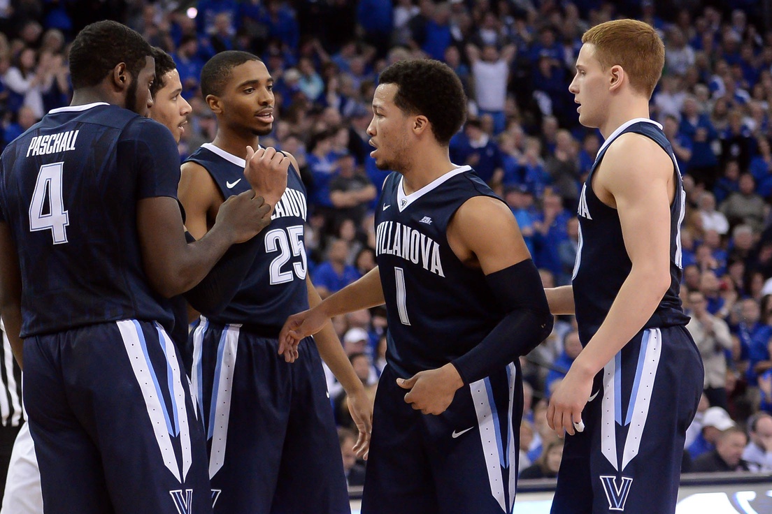 Villanova Wildcats guard Jalen Brunson (1) huddles with forward Eric Paschall (4) and guard Mikal Bridges (25) and guard Donte DiVincenzo (10) after a call against the Creighton Bluejays at CenturyLink Center Omaha. Villanova defeated Creighton 80-70.