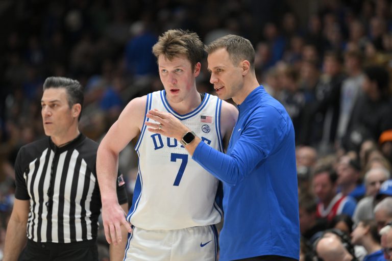 Duke Blue Devils head coach Jon Scheyer directs Duke Blue Devils forward Kon Knueppel (7) during the second half at Cameron Indoor Stadium. Blue Devils won 106-70.
