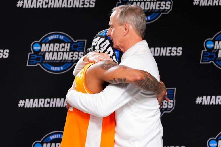 Tennessee head coach Rick Barnes and Tennessee guard Zakai Zeigler (5) have a long hug after a press conference after Tennessee's NCAA Tournament Elite Eight loss to Houston