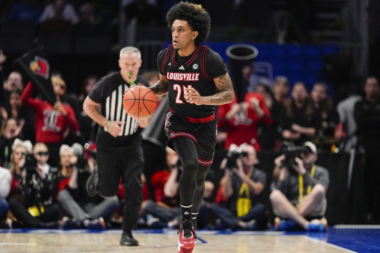Louisville Cardinals guard Chucky Hepburn (24) brings the ball up court against the Duke Blue Devils during the 2025 ACC Conference Championship game at Spectrum Center.