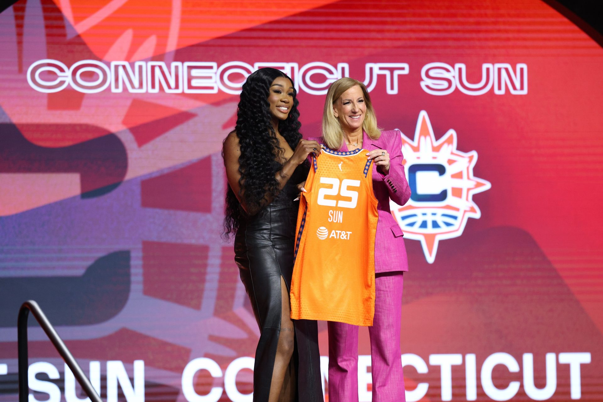 Aneesah Morrow poses with WNBA commissioner Cathy Engelbert after being selected with the number seven overall pick to the Connecticut Sun in the 2025 WNBA Draft at The Shed at Hudson Yards.