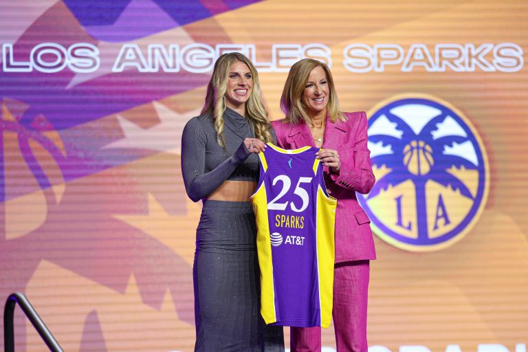 Sarah Ashlee Barker poses with WNBA commissioner Cathy Engelbert after being selected with the number nine overall pick to the Los Angeles Sparks in the 2025 WNBA Draft at The Shed at Hudson Yards.