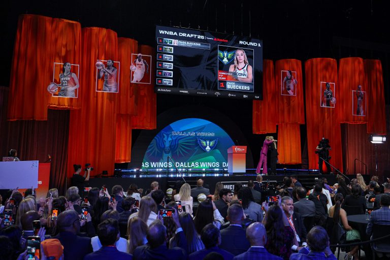 Paige Bueckers is greeted by WNBA commissioner Cathy Engelbert after being selected with the number one overall pick to the Dallas Wings in the 2025 WNBA Draft at The Shed at Hudson Yards.