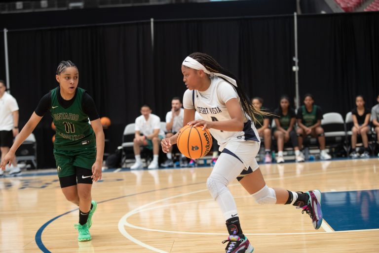 Desert Vista guard Marissa France (4) and Ontario Christian guard Kaleena Smith (11) playing in the Section 7 Girls Hoops