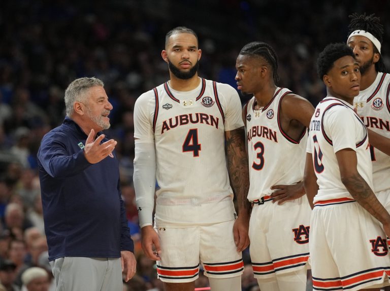 Auburn Tigers head coach Bruce Pearl talks with his players against the Florida Gators in the semifinals of the men's Final Four of the 2025 NCAA Tournament at the Alamodome.