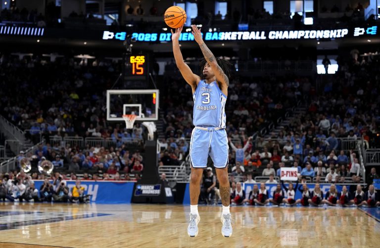 North Carolina Tar Heels guard Elliot Cadeau (3) shoots during the second half of a first round NCAA men’s tournament game against the Mississippi Rebels at Fiserv Forum.