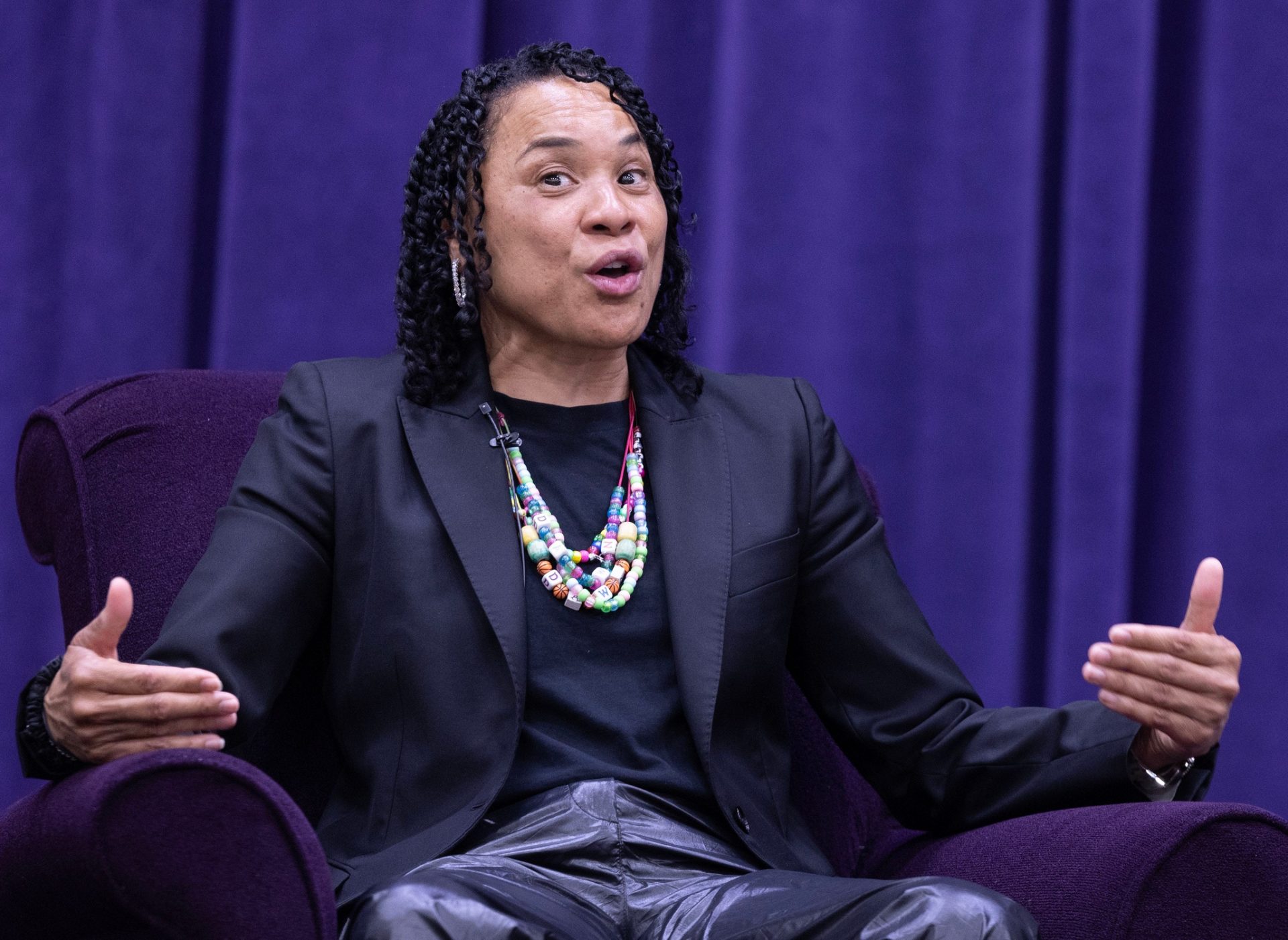 University of South Carolina women's basketball coach Dawn Staley answers a question by moderator Dan Hughes during the University of Mount Union's Schooler Lecture speaker series on April 23, 2025, in Alliance, Ohio.