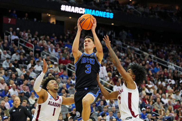 Brigham Young Cougars guard Egor Demin (3) drives to the basket against Alabama Crimson Tide guard Mark Sears (1) during the second half during an East Regional semifinal of the 2025 NCAA tournament at Prudential Center.