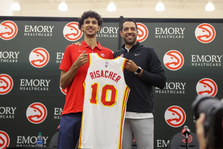 Atlanta Hawks first overall draft pick Zaccharie Risacher poses for a photo with general manager Landry Fields at the Emory Sports Medicine Complex.