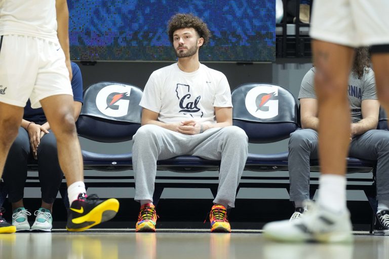California Golden Bears guard Devin Askew (55) sits on the sidelines before the game against the Colorado Buffaloes at Haas Pavilion.