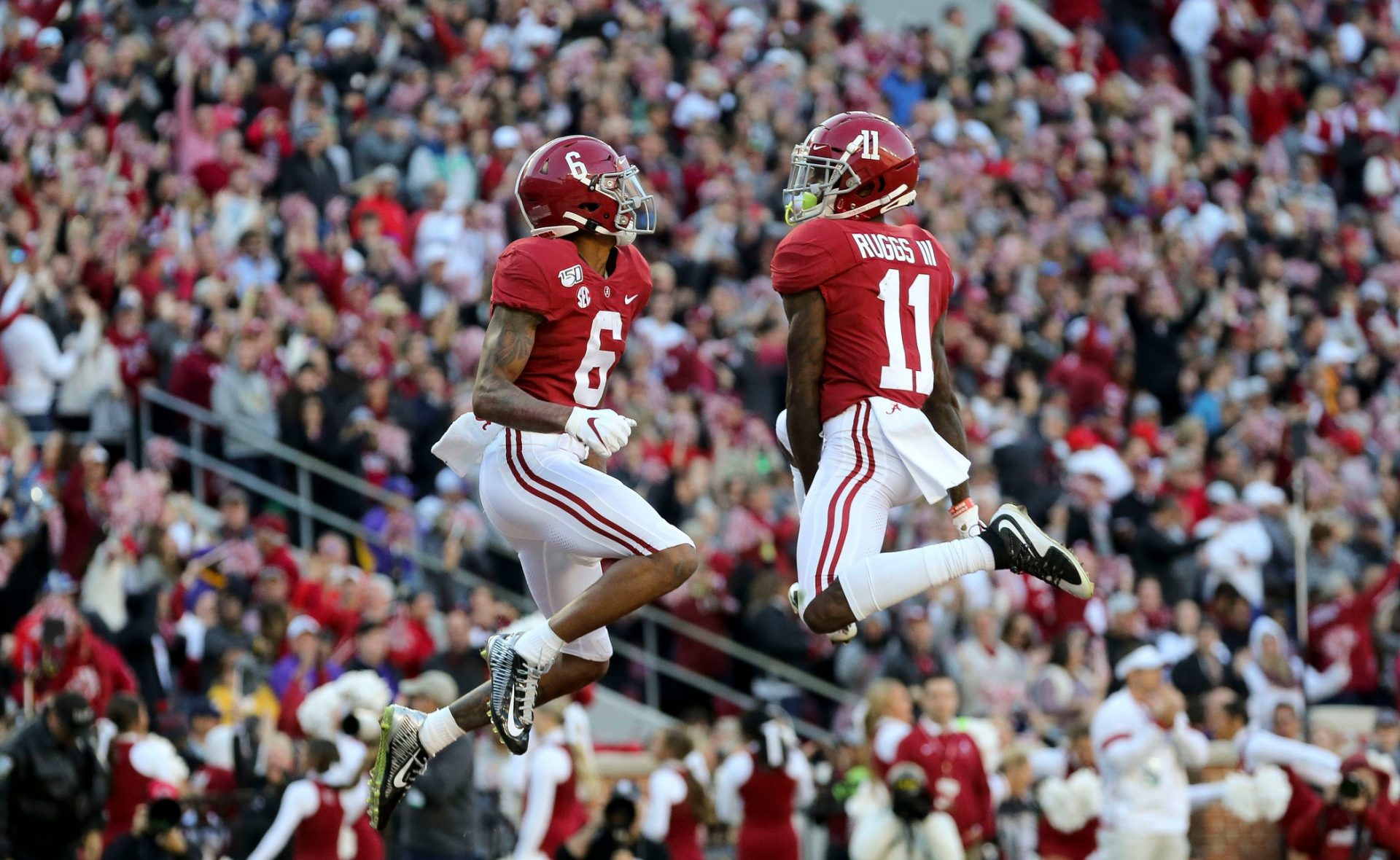 Alabama wide receiver DeVonta Smith (6) and Alabama wide receiver Henry Ruggs III (11) celebrate a touchdown catch by Smith during LSU's 46-41 win over Alabama Saturday, Nov. 9, 2019. [Staff Photo/Gary Cosby Jr.]