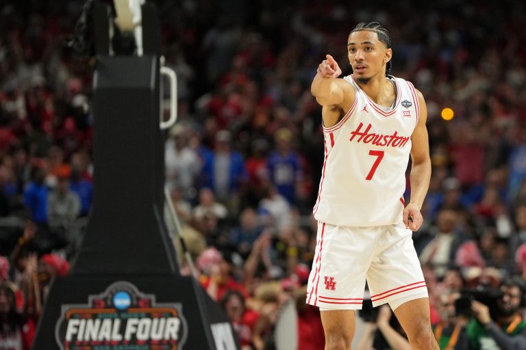 Houston Cougars guard Milos Uzan (7) reacts after a play against the Florida Gators during the first half of the national championship game of the Final Four of the 2025 NCAA Tournament at the Alamodome.