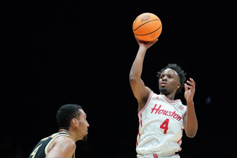 Houston Cougars guard L.J. Cryer (4) shoots the ball against the Purdue Boilermakers in the second half during a Midwest Regional semifinal of the 2025 NCAA tournament at Lucas Oil Stadium.