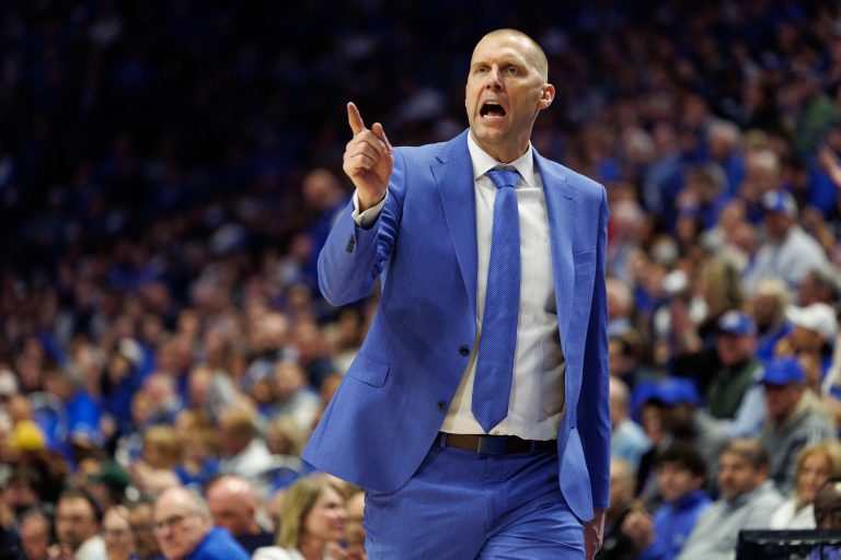 Kentucky Wildcats head coach Mark Pope talks to his players during the second half against the Louisville Cardinals at Rupp Arena at Central Bank Center.