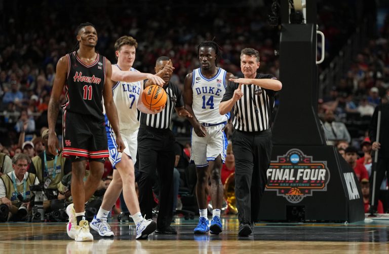 Houston Cougars forward Joseph Tugler (11) reacts after the officials call a technical foul during the second half in the semifinals of the men's Final Four of the 2025 NCAA Tournament at the Alamodome.