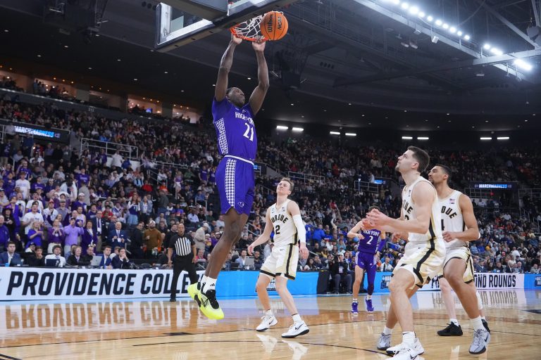 High Point Panthers forward Juslin Bodo Bodo (21) dunks against the Purdue Boilermakers during the second half at Amica Mutual Pavilion.