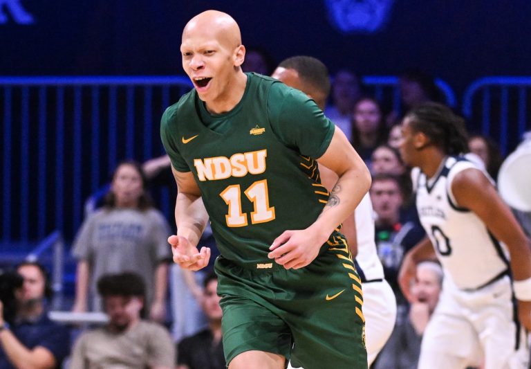 North Dakota State Bison guard Jacari White (11) celebrates after making a three-point basket during the first half against the Butler Bulldogs at Hinkle Fieldhouse.