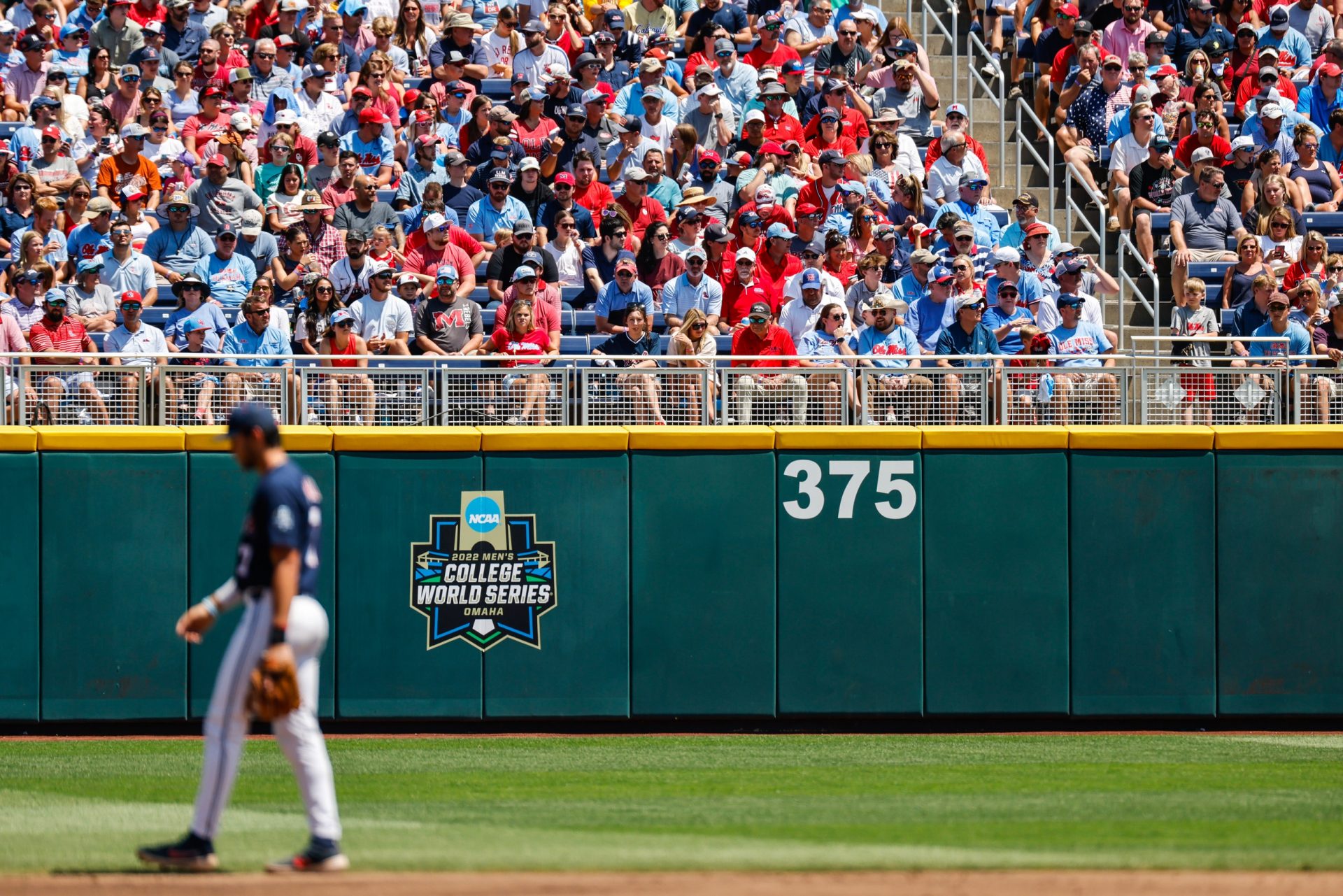 Ole Miss and Oklahoma fans just above the College Work Series logo during the first inning against at Charles Schwab Field.