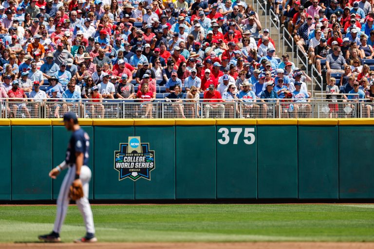 Ole Miss and Oklahoma fans just above the College Work Series logo during the first inning against at Charles Schwab Field.
