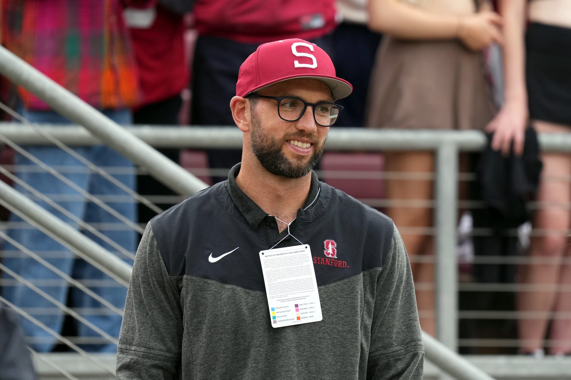 Stanford Cardinal and NFL former quarterback Andrew Luck stands on the sidelines during the second quarter against the Oregon Ducks at Stanford Stadium.
