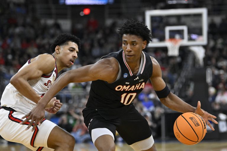 Omaha Mavericks forward Marquel Sutton (10) controls the ball against St. John's Red Storm during the first half at Amica Mutual Pavilion.