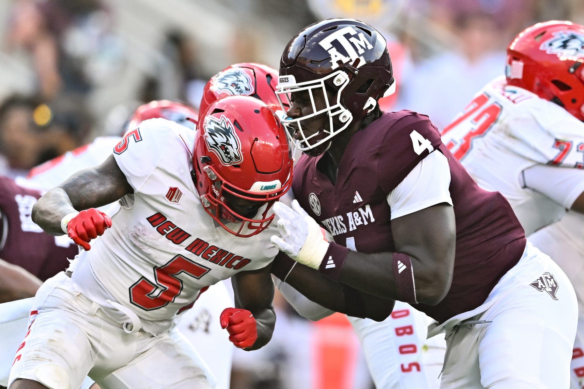 Sep 2, 2023; College Station, Texas, USA; Texas A&M Aggies defensive lineman Shemar Stewart (4) and New Mexico Lobos running back Jacory Croskey-Merritt (5) in action during the first half at Kyle Field. Mandatory Credit: Maria Lysaker-USA TODAY Sports