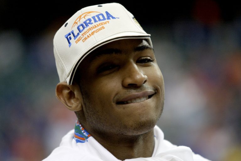 Florida Gators forward Al Horford celebrates after the Gators defeated the Arkansas Razorbacks 77-56 to win the SEC Tournament championship game at the Georgia Dome.