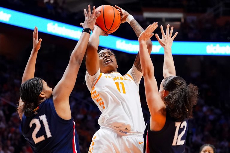 Tennessee forward Zee Spearman (11) attempts a shot past UConn forward Sarah Strong (21) and UConn guard Ashlynn Shade (12) during a women's college basketball game between the Lady Vols and UConn at Thompson-Boling Arena at Food City Center in Knoxville on Thursday, February 6, 2025.