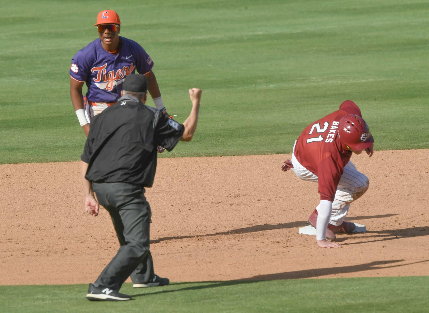 Clemson sophomore Jarren Purify (23) celebrates a double play against South Carolina to get out of the inning, during the bottom of the seventh inning of the Reedy River Rivalry at Fluor Field in Greenville, S.C. Saturday, March 1, 2025.