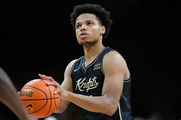 UCF Knights guard Keyshawn Hall (4) warms up before the game against the Colorado Buffaloes at the CU Events Center.