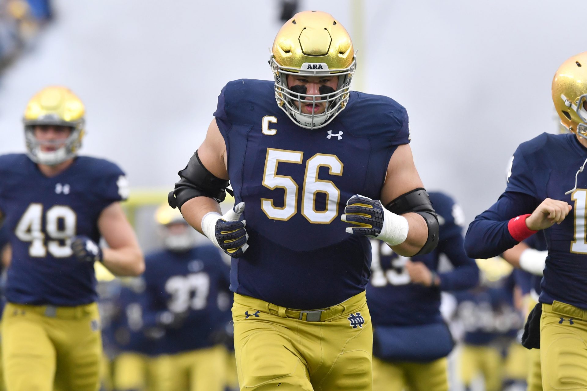 Notre Dame Fighting Irish offensive lineman Quenton Nelson (56) runs onto the field for the game against the Wake Forest Demon Deacons at Notre Dame Stadium.
