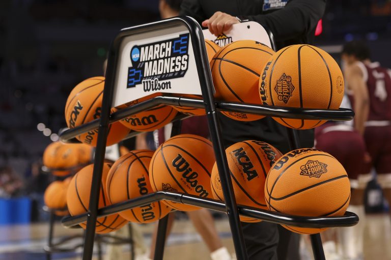 A view of the Wilson game basketballs and March Madness and Final Four logos during the second half pf the game between the Kansas Jayhawks and the Texas Southern Tigers in the first round of the 2022 NCAA Tournament at Dickies Arena.