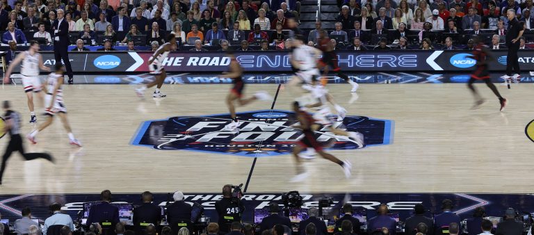 A general view of the logo on the court during the first half in the national championship game of the 2023 NCAA Tournament between the San Diego State Aztecs and the Connecticut Huskies during the first half at NRG Stadium.