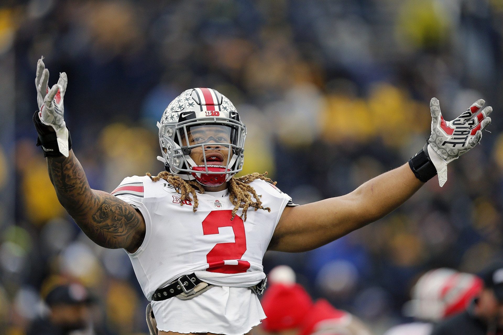Ohio State Buckeyes defensive end Chase Young (2) gets the Ohio State Buckeyes pumped up during warm ups against Michigan Wolverines in Ann Arbor, Michigan on November