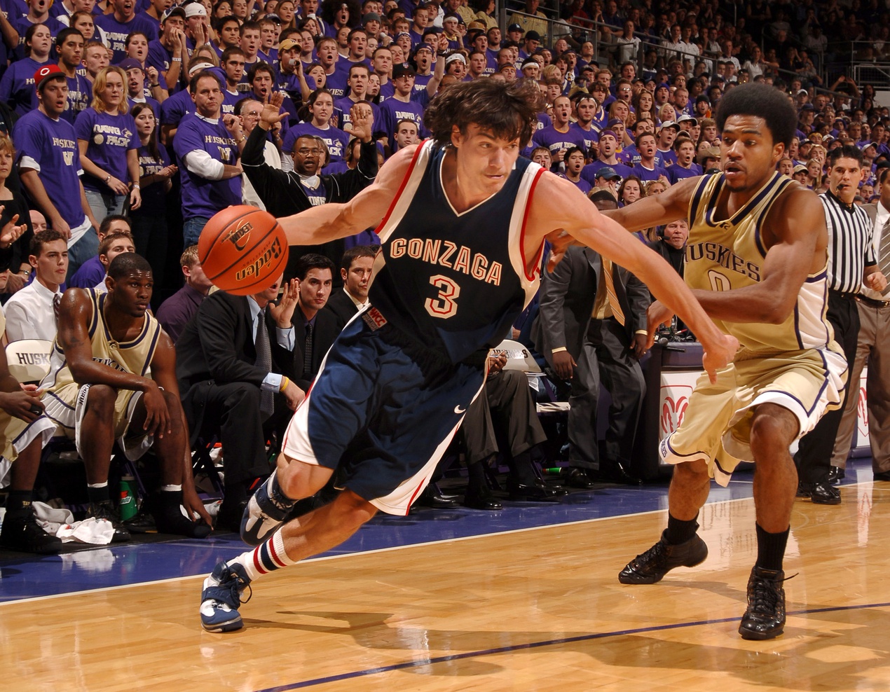 Adam Morrison forward #3 of the Gonzaga Bulldogs drives to the basket against the Washington Huskies in the first half at the Bank of America Arena.