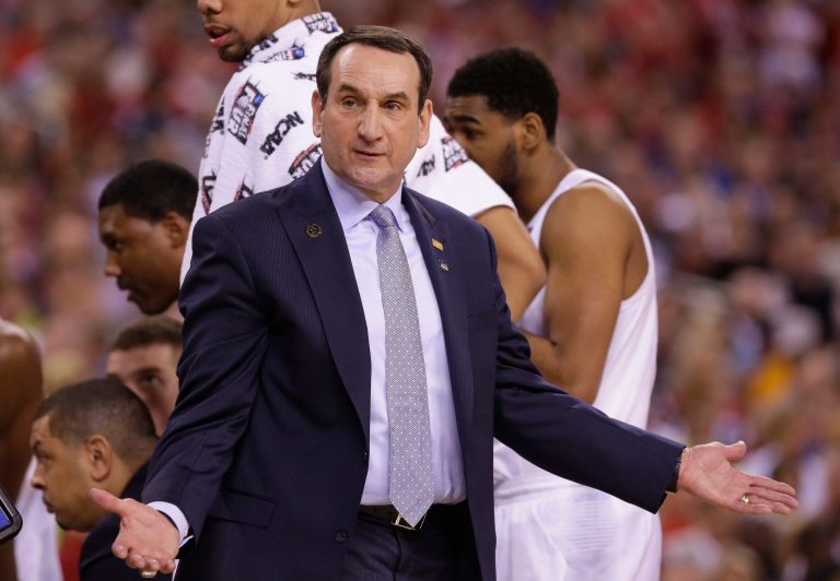 Duke head coach Mike Krzyzewski argues a call during first half of their NCAA Final Four college basketball tournament championship against Wisconsin Monday, April 6 2015 at Lucas Oil Stadium