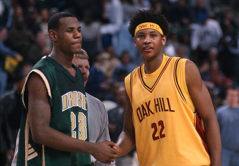 St. Vincent-St. Mary junior LeBron James and Oak Hill senior Carmelo Anthony meet at half court after the Irish's 72-66 loss. James had 36 points in the game.