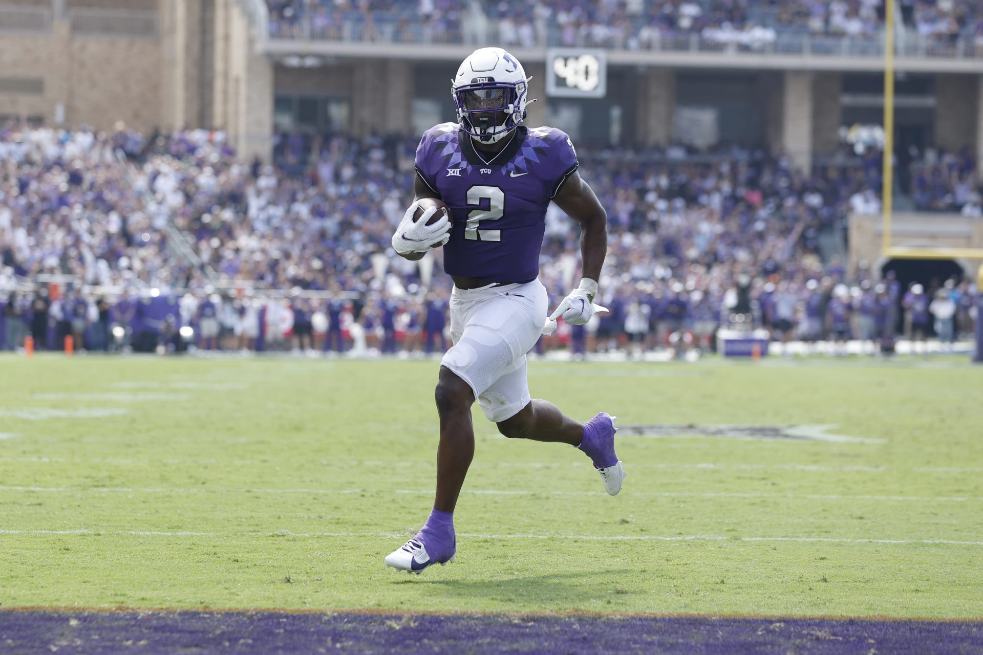 TCU Horned Frogs running back Trey Sanders (2) scores a touchdown in the second quarter against the Colorado Buffaloes at Amon G. Carter Stadium.