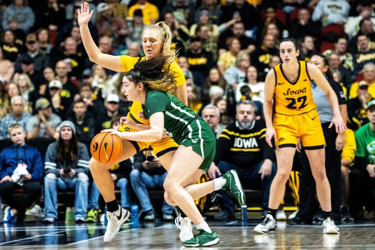 Iowa's Sydney Affolter guards Cleveland State's Mickayla Perdue during the Hawkeye Showcase at Wells Fargo Arena on Saturday, Dec. 16, 2023, in Des Moines.