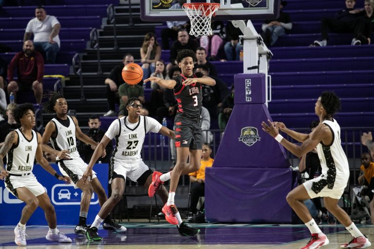 Kiyan Anthony of Long Island Lutheran makes a pass against Link Academy in the second semifinal matchup in the City of Palms Classic on Friday, Dec. 22, 2023 at Suncoast Credit Union Arena in Fort Myers.