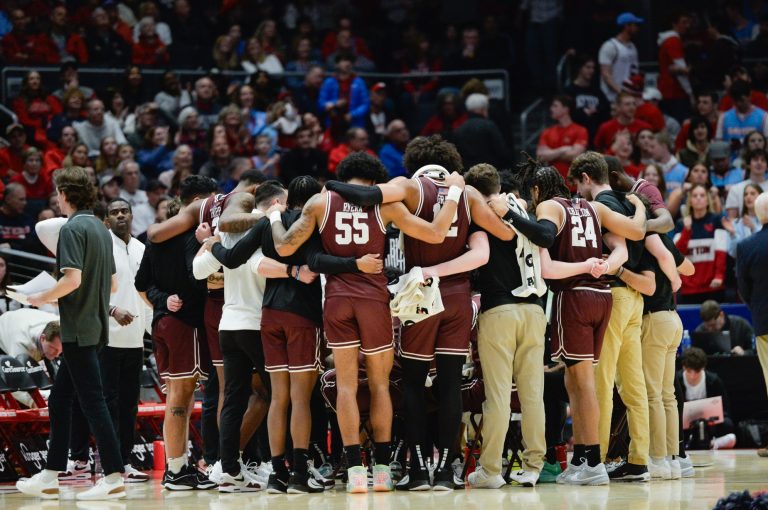 The Fordham Rams Rams huddle up during a timeout during a game against the Dayton Flyers at University of Dayton Arena.