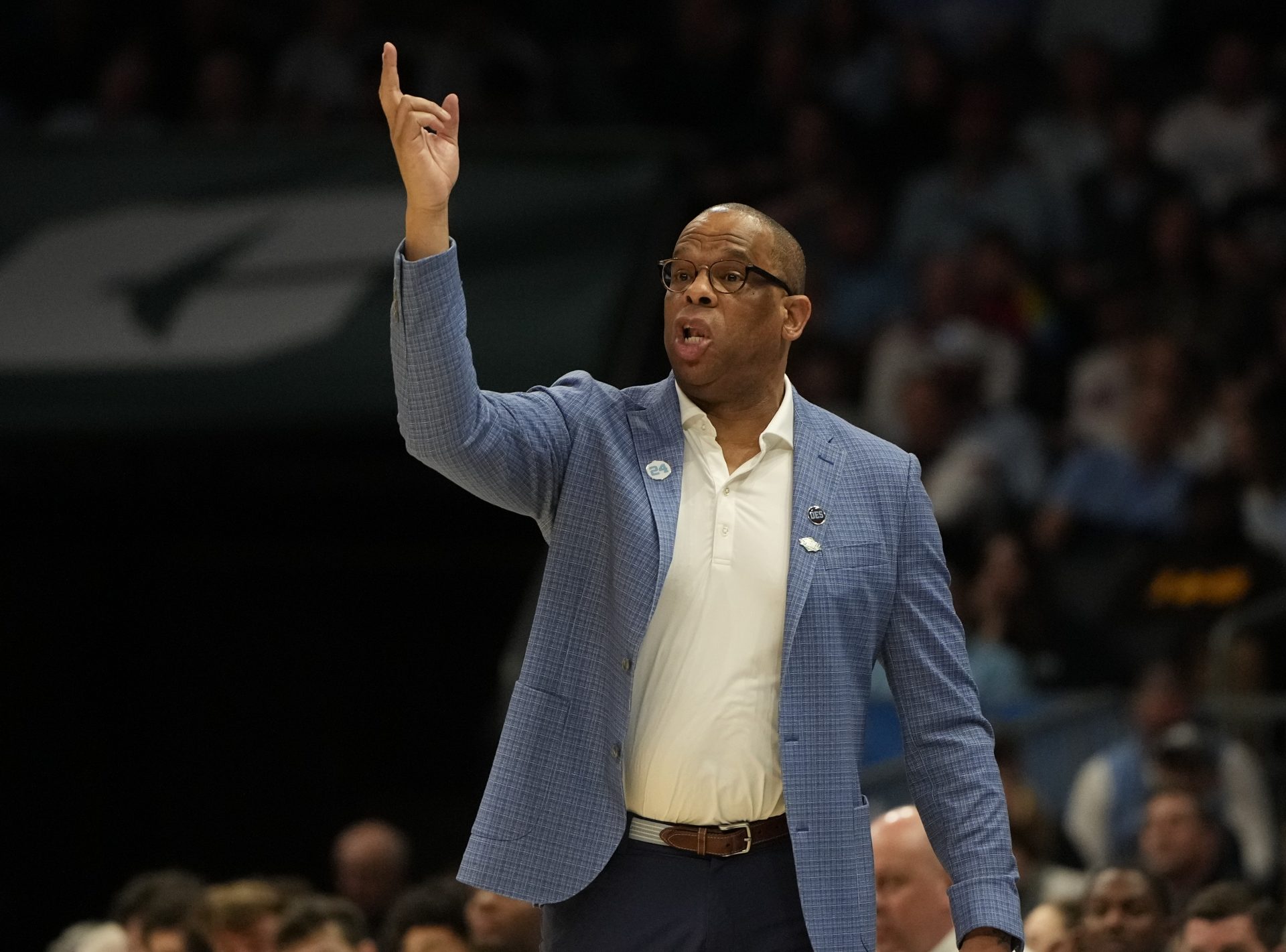 North Carolina Tar Heels head coach Hubert Davis reacts against the Wagner Seahawks in the first round of the 2024 NCAA Tournament at the Spectrum Center.
