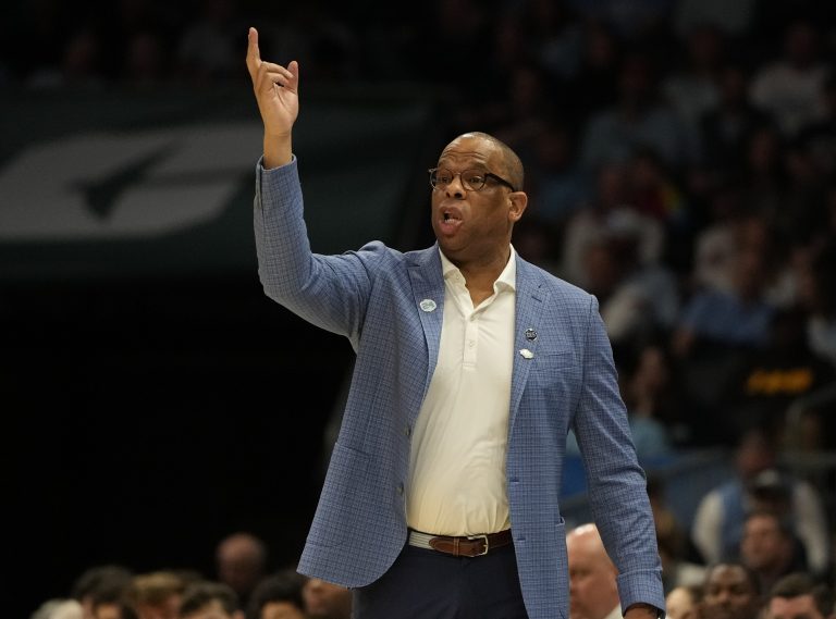 North Carolina Tar Heels head coach Hubert Davis reacts against the Wagner Seahawks in the first round of the 2024 NCAA Tournament at the Spectrum Center.