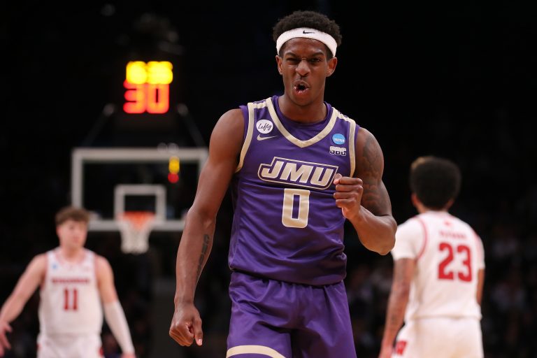James Madison Dukes guard Xavier Brown (0) reacts against the Wisconsin Badgers in the first round of the 2024 NCAA Tournament at the Barclays Center.