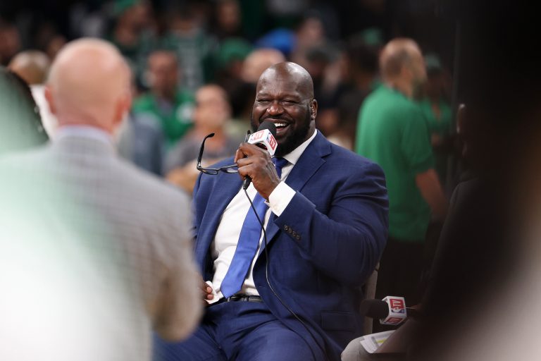 NBA former player Shaquille O'Neill laughs on the NBA TV set before game two of the 2024 NBA Finals between the Boston Celtics and the Dallas Mavericks at TD Garden.