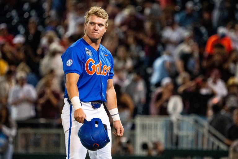Florida Gators third baseman Dale Thomas (1) walks off the field after being defeated by the Texas A&M Aggies at Charles Schwab Field Omaha.