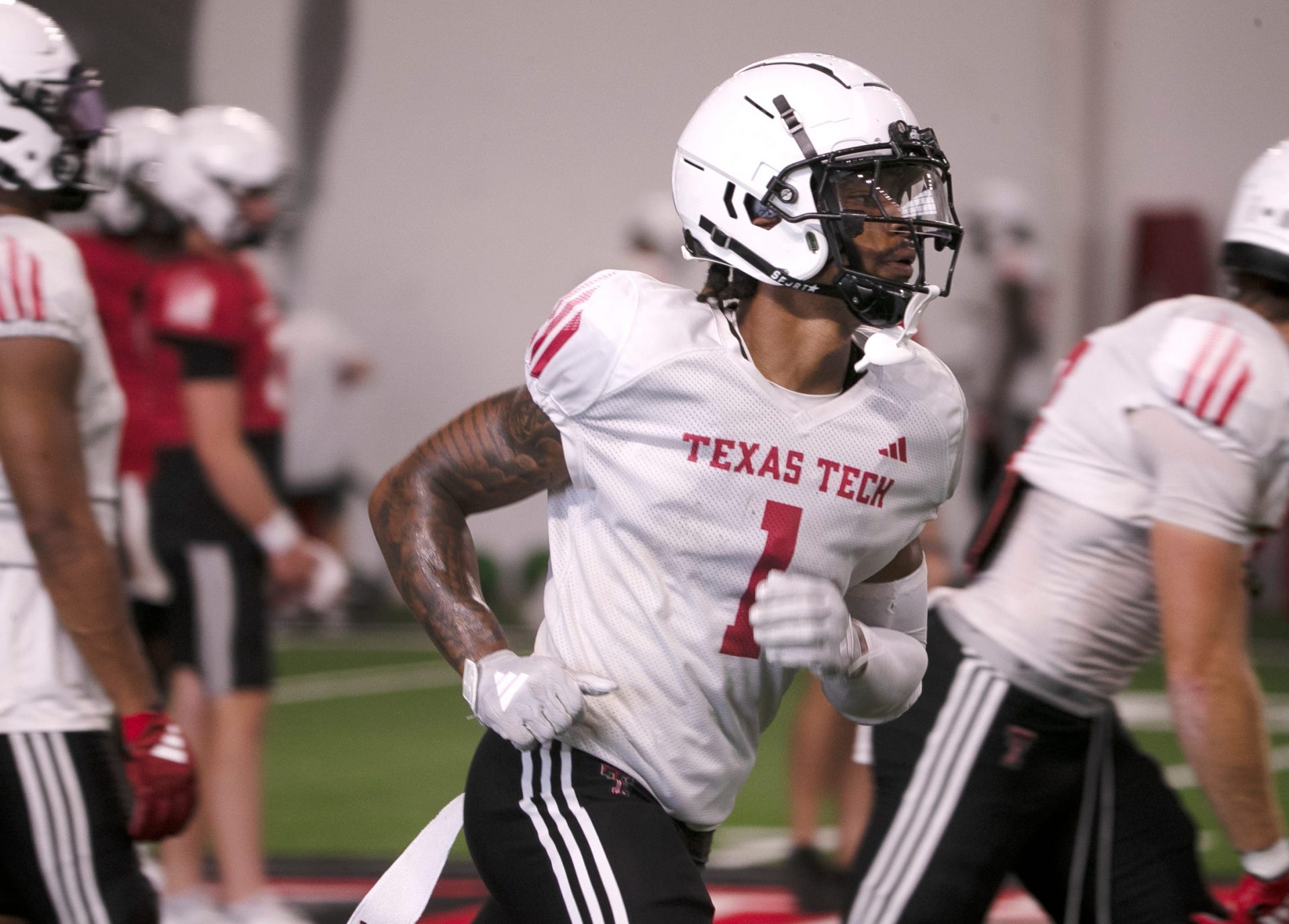 Texas Tech wide receiver Micah Hudson does a drill during football practice