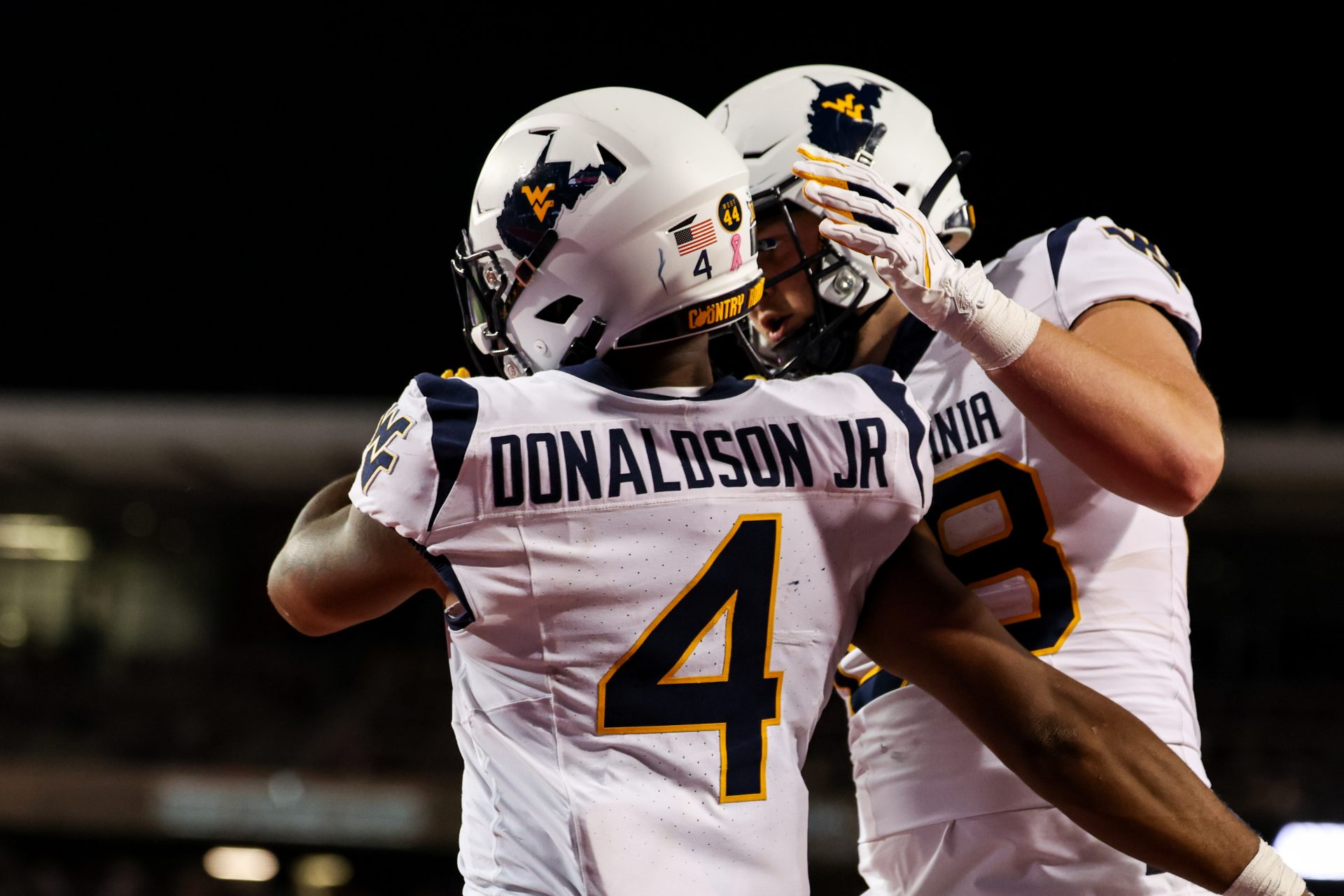 West Virginia Mountaineers running back CJ Donaldson Jr. (4) celebrates touchdown made against the Arizona Wildcats during the third quarter at Arizona Stadium.